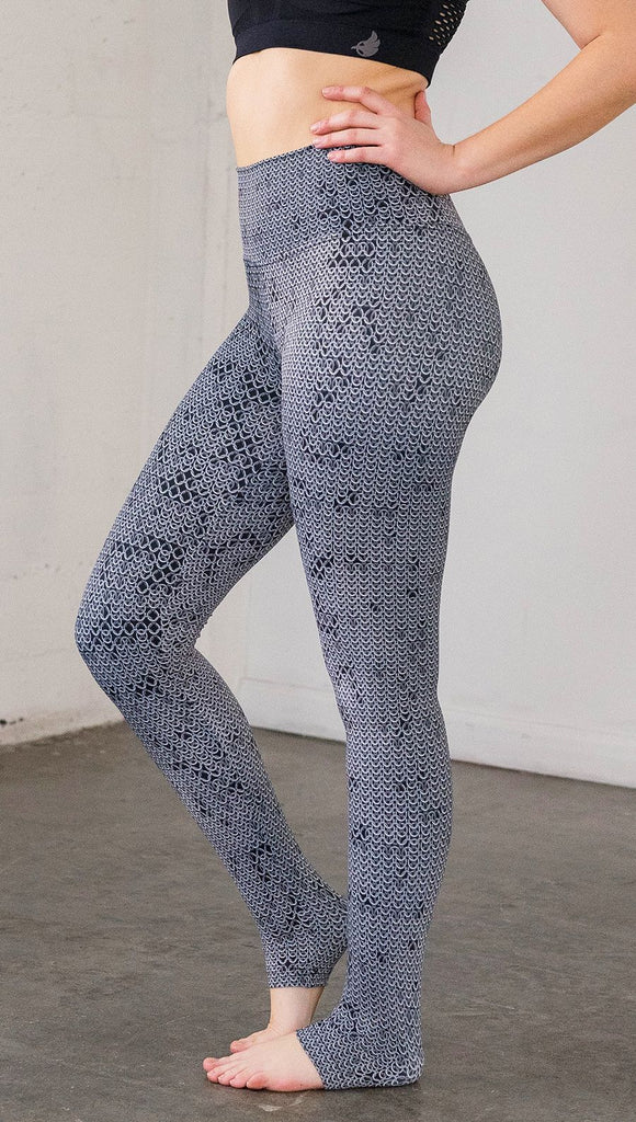 Left side view of model wearing chainmaille inspired full length leggings