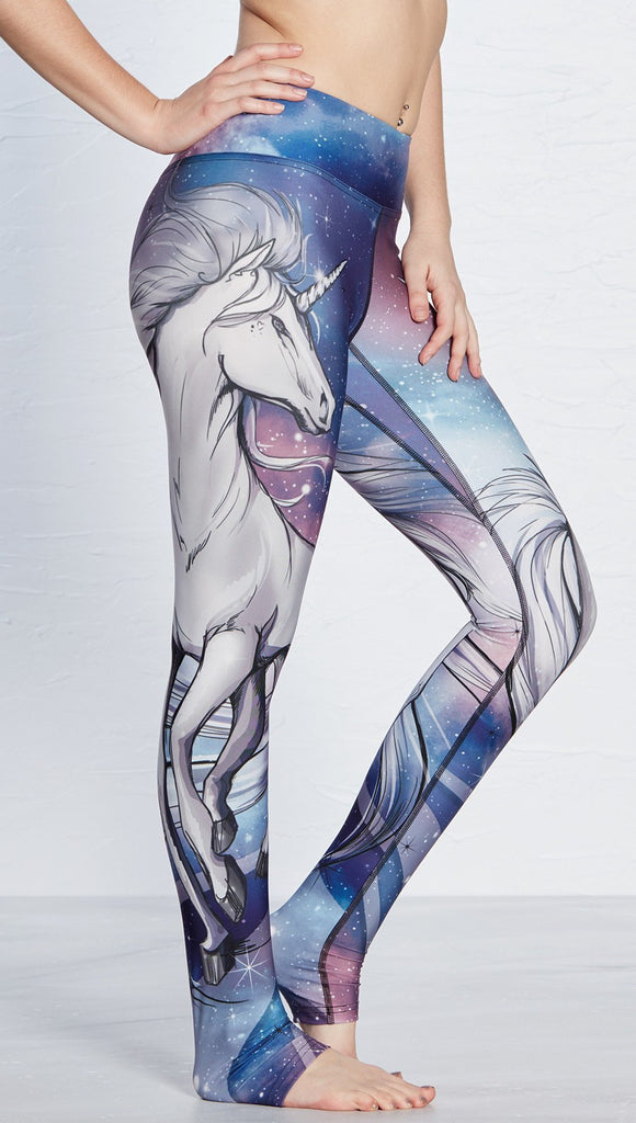 closeup right side view of model wearing unicorn design printed full length leggings