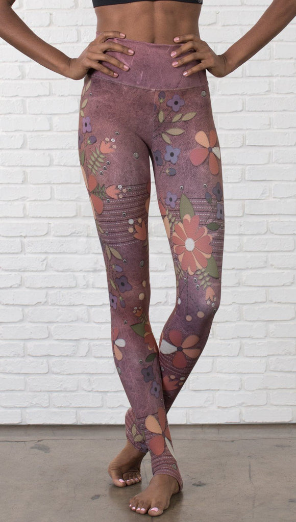 close up front view of model wearing vintage flower pattern printed full length leggings