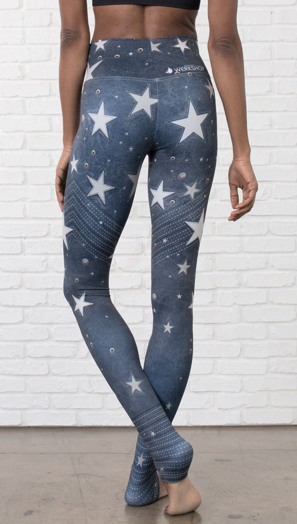 closeup back view of model wearing vintage patriotic stars design full length leggings