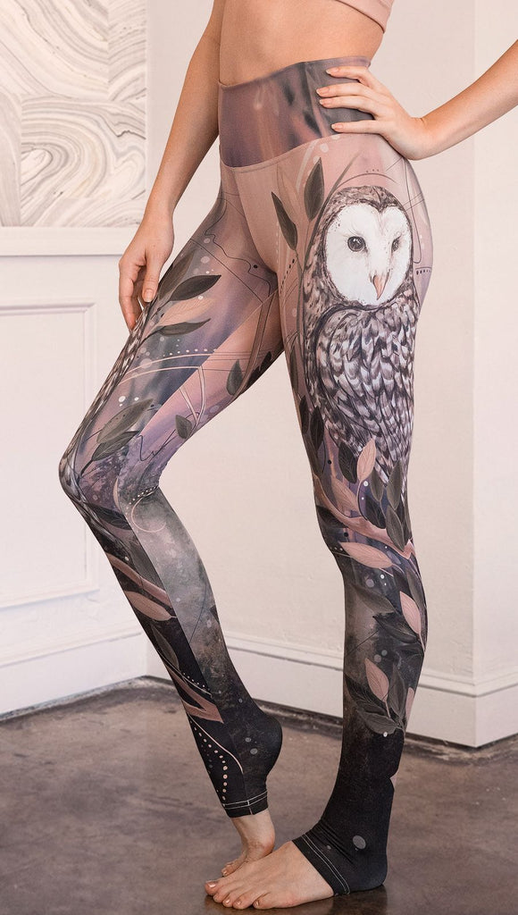 closeup left side view of model wearing owl themed full length leggings