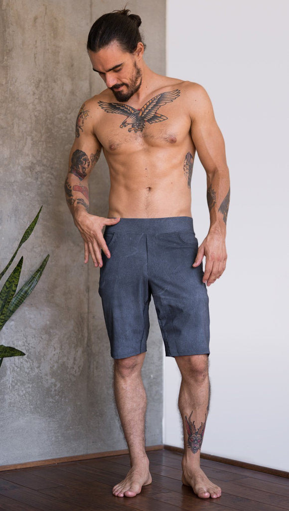 front view of model wearing slate mens performance shorts