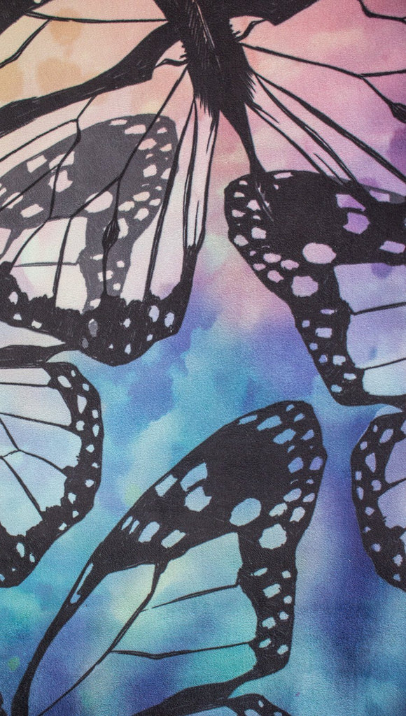 closeup view of colorful butterfly themed printed yoga mat