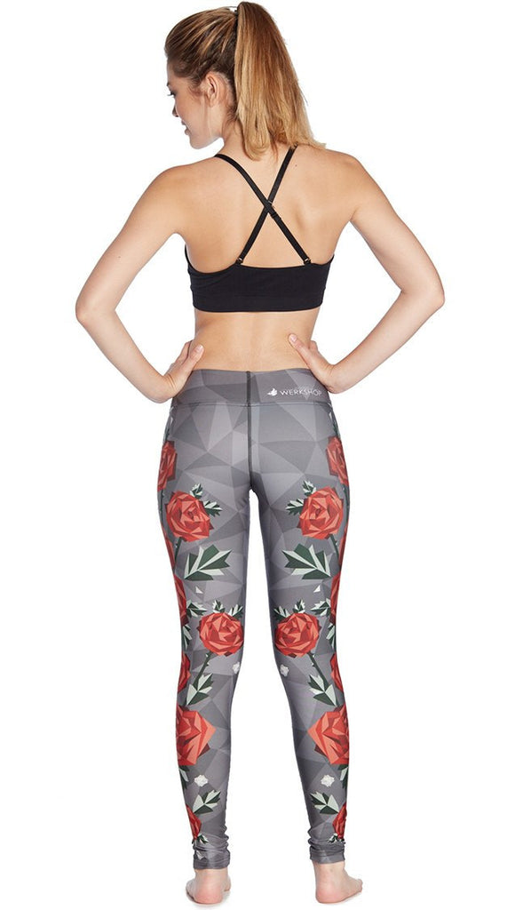 back view of model wearing polygon roses themed printed full length leggings
