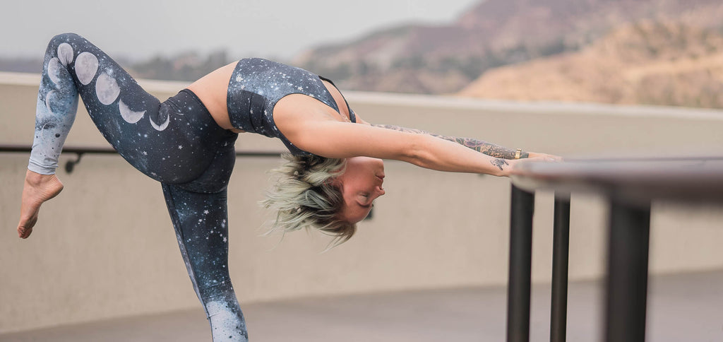Yogi doing a standing backbend in Griffith Park, CA wearing WERKSHOP Moon Phases Athleisure Set