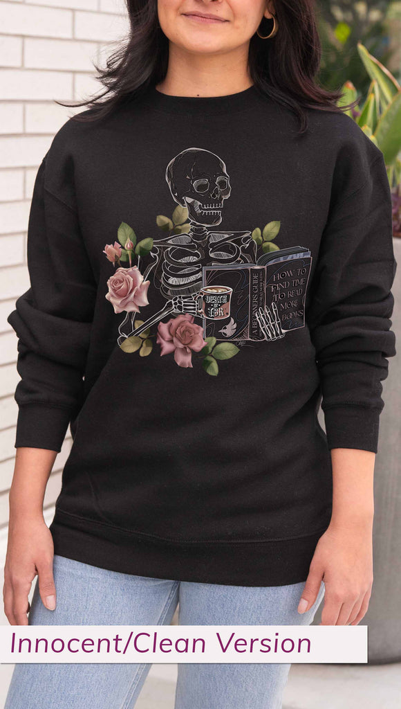 Person wearing a black sweatshirt with a skeleton and floral design, standing outdoors. The pullover features the bookish phrases, "Death by TBR" and "A Beginners Guide: How to Find Time to Read More Books"