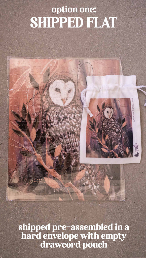 WERKSHOP Barn Owl 252 piece jigsaw puzzle. The puzzle is printed with original artwork of an Owl by Chriztina Marie. It features a barn owl perched on top of a branch with whimsical leaves. The overall color story is of mauves, warm browns and complimentary green leaves. Option 1: shipped flat, pre-assembled in a hard envelope with empty drawcord pouch.