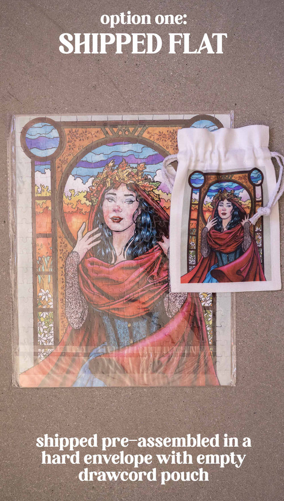 Art Nouveau Puzzle featuring original artwork by Scott Christian Sava. The painting features a woman with a cloak and crown of autumn leaves standing in front of a stained glass window. Option 1: Shipped pre-assembled in a hard envelope with hard envelop with empty drawcord pouch.