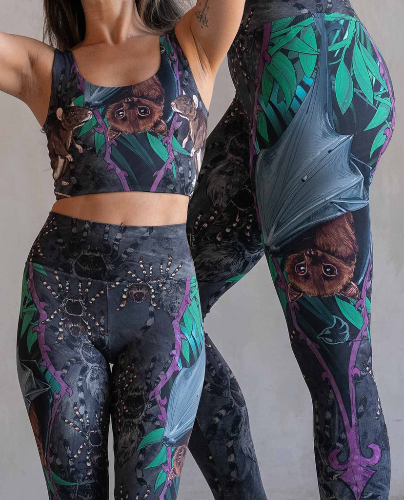side-by-side images of a model wearing our SPOOKY SEASON leggings and top. Featuring a flying fox/fruit bat, rats and tarantulas.