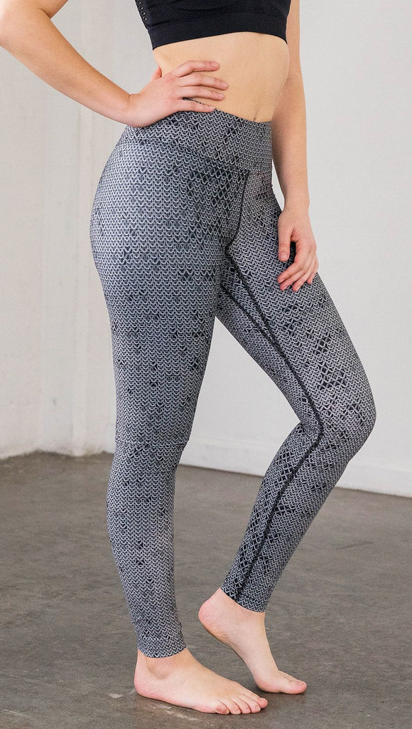 Right side view of model wearing chainmaille inspired full length leggings