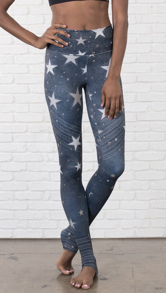 closeup front view of model wearing vintage patriotic stars design full length leggings