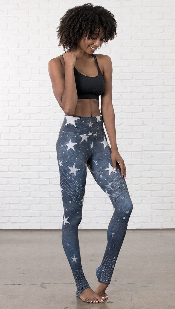 closeup front view of model wearing vintage patriotic stars design full length leggings