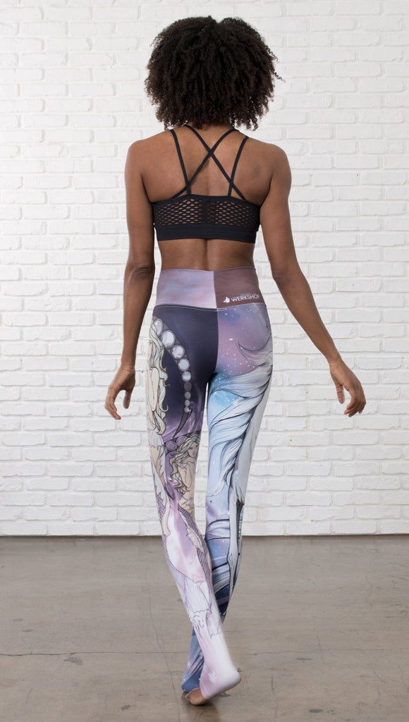 back view of model wearing full length leggings with unicorn and mermaid mashup printed design