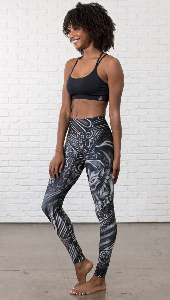 front view of model wearing galaxy themed printed full length leggings