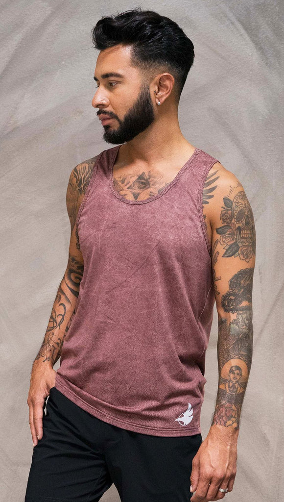 Close up front view of model wearing brick red printed tank top