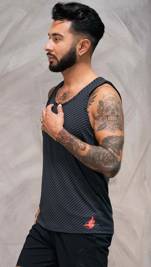 Close up left side view of model wearing black tank top with carbon fiber inspired art