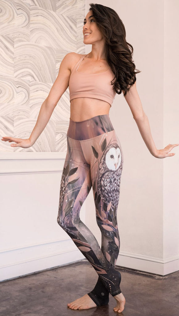 front view of model wearing owl themed full length leggings
