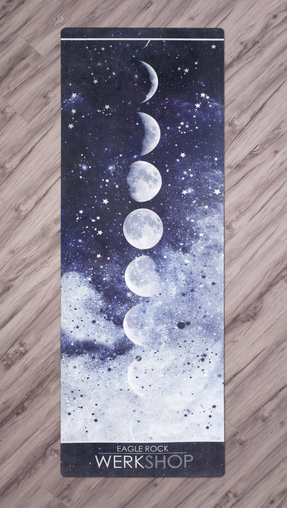 full top view of moon cycle themed yoga mat