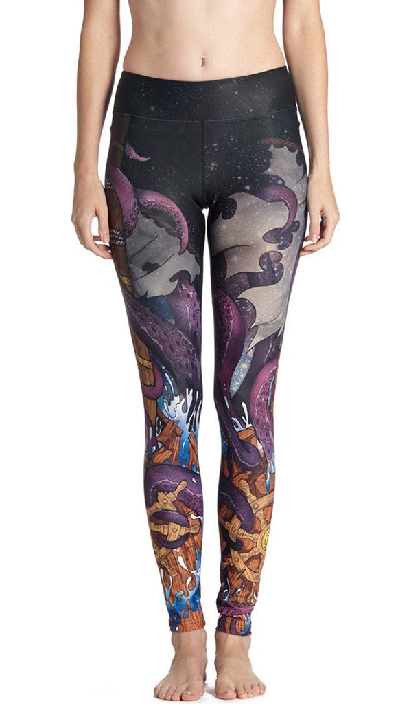 closeup front view of model wearing mythical octopus themed printed full length leggings