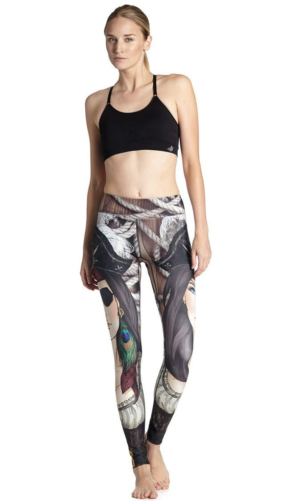 front view of model wearing pirate girl themed printed full length leggings