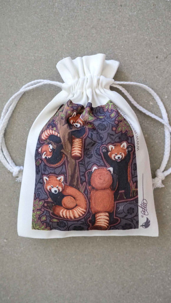 WERKSHOP Red Pandas Canvas drawstring pouch (comes free with matching puzzle)!. The artwork features 5 adorable red pandas playing near an abstract tree with a warm gray background.