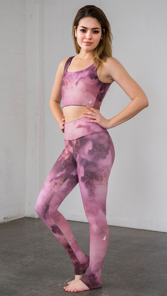 left side view of model wearing rose quartz stone design printed full length leggings