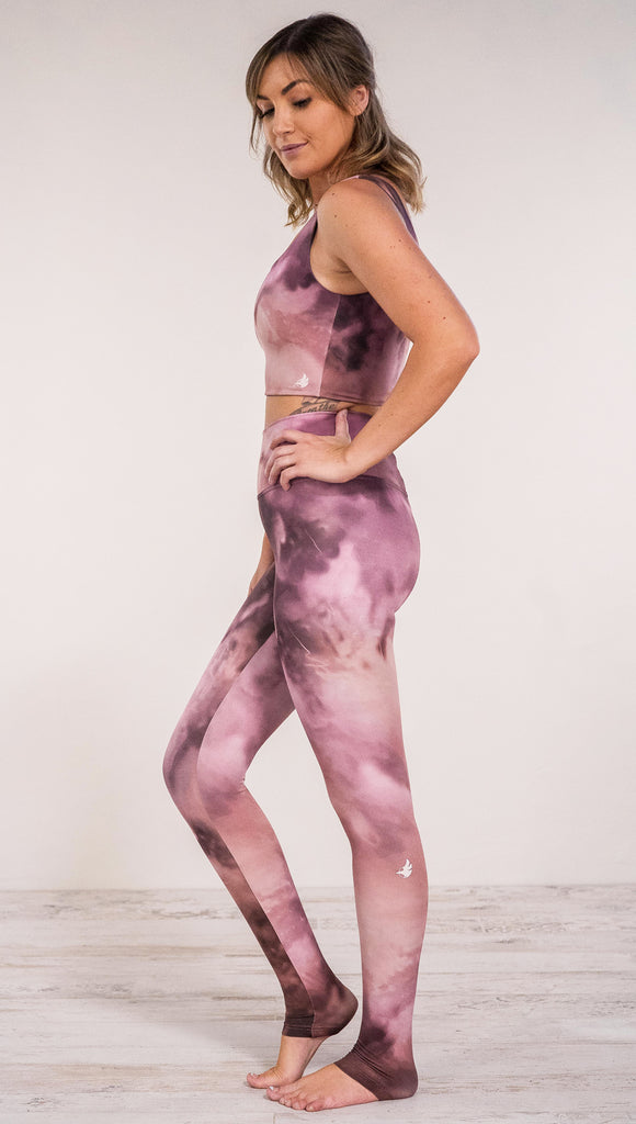 Left side view of model wearing rose quartz stone design printed full length leggings