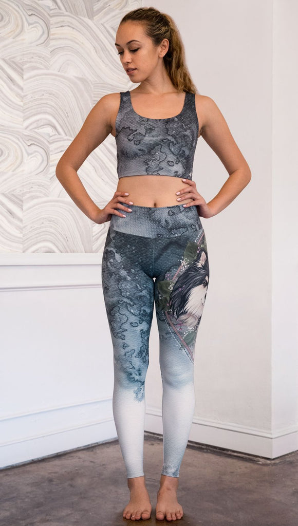 front view of model wearing full length Finnish Lapphund artwork themed leggings