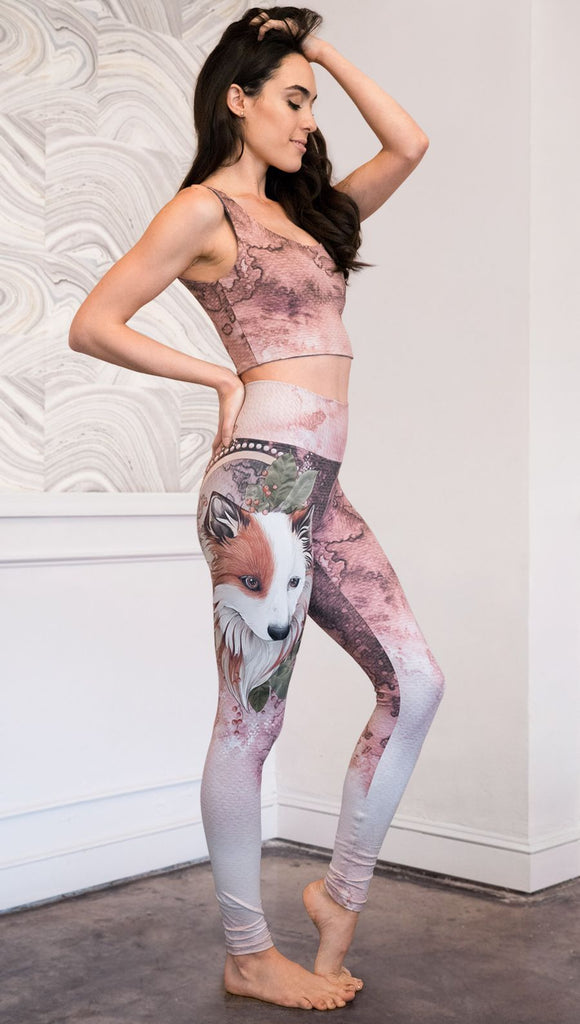 right side view of model wearing Pink/Mauve Icelandic Sheepdog Leggings with Original Tattoo-Inspired artwork