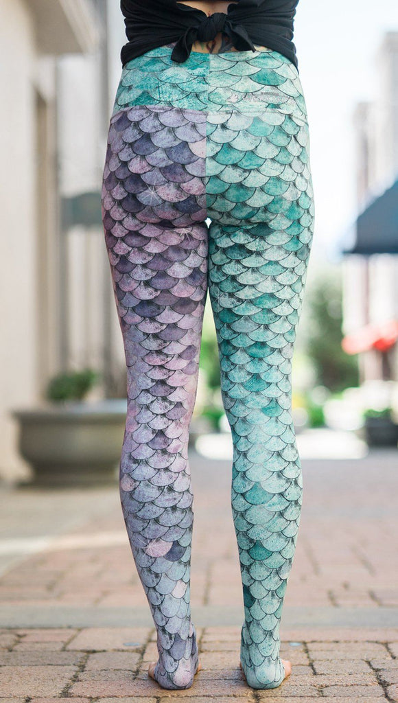 closeup back view of model wearing mermaid scales design printed full length leggings