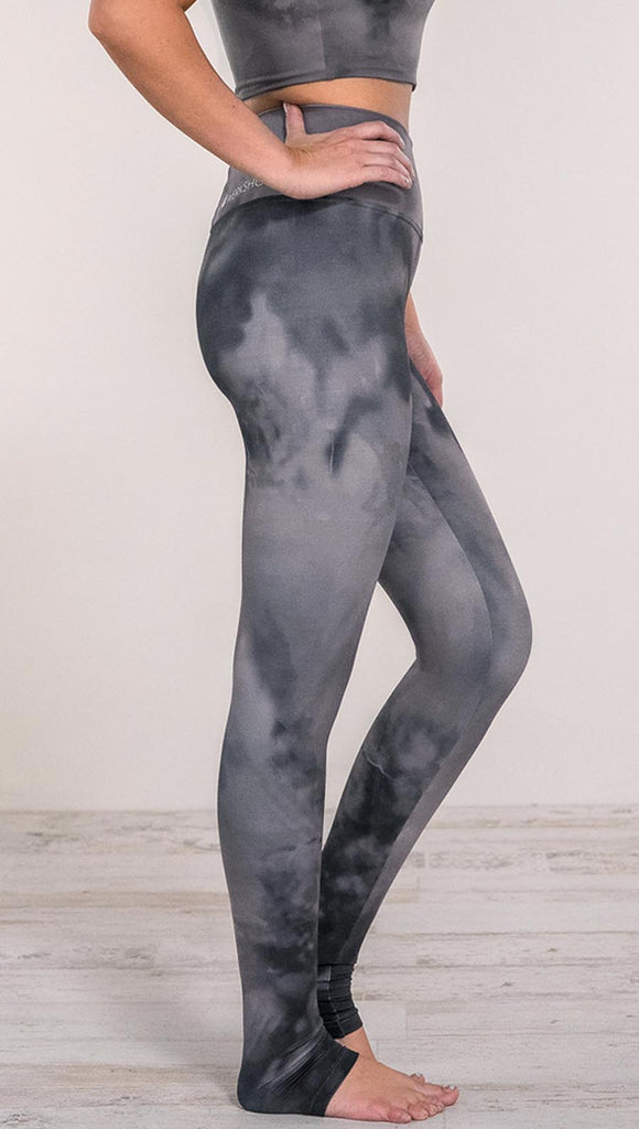 girl wearing smoke gray leggings with watercolor effect