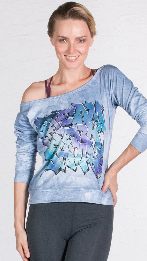 front view of model wearing graffiti design pullover 