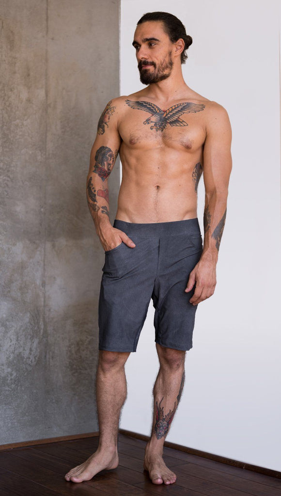 front view of model wearing gray mens performance shorts