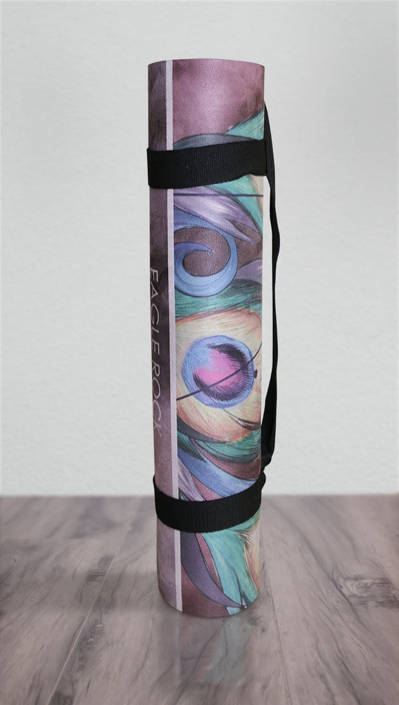 view of rolled up peacock design yoga mat