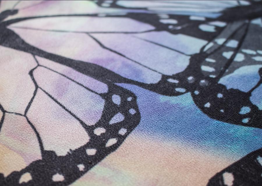 closeup view of colorful butterfly themed printed yoga mat