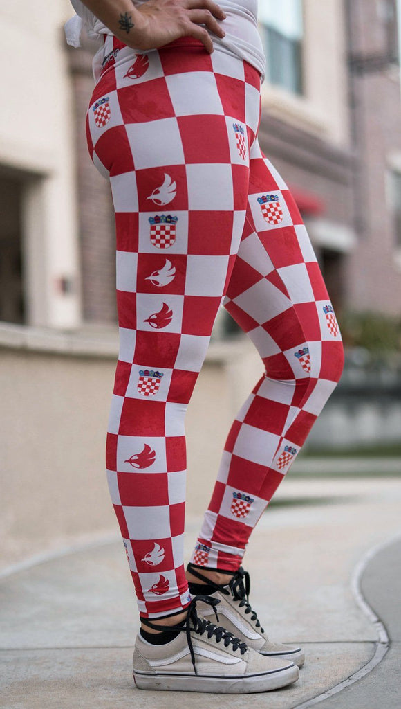 right side view of model wearing croatian checkered themed full length leggings