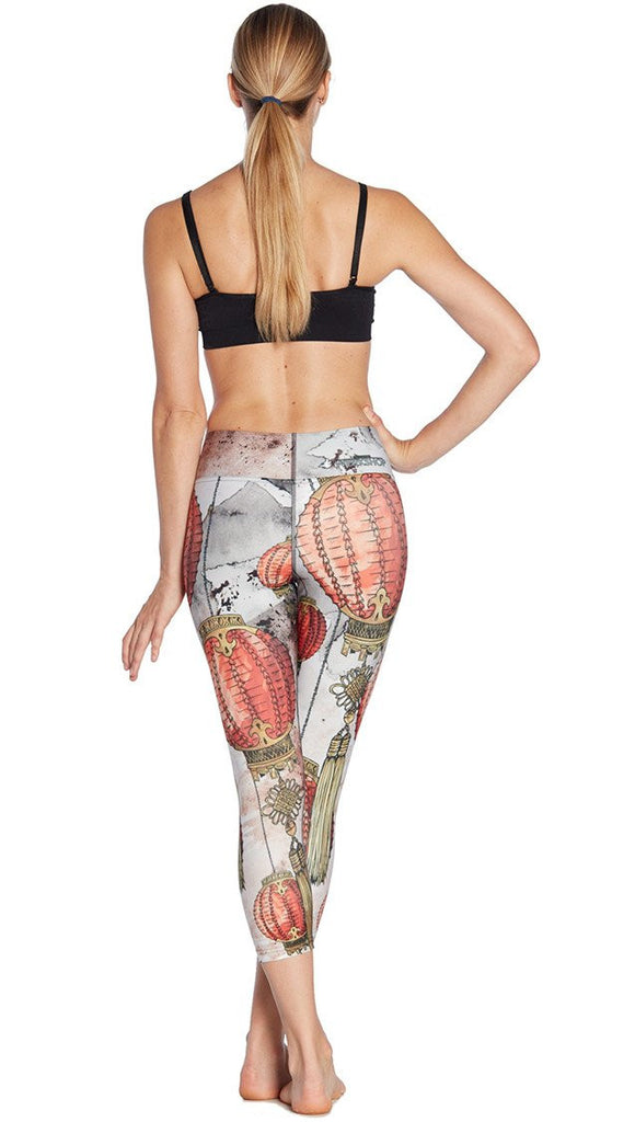 back view of model wearing Chinese festival lanterns themed printed capri leggings