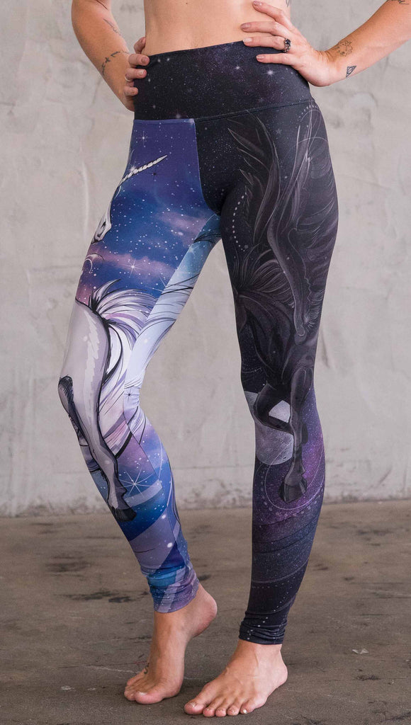 Left view of model wearing the nightmare mashup leggings. This leg has a black horse with wings