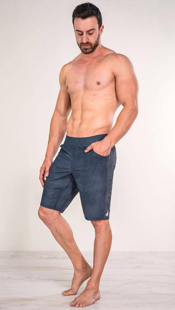 Diagonally left side view of model wearing slate mens performance shorts